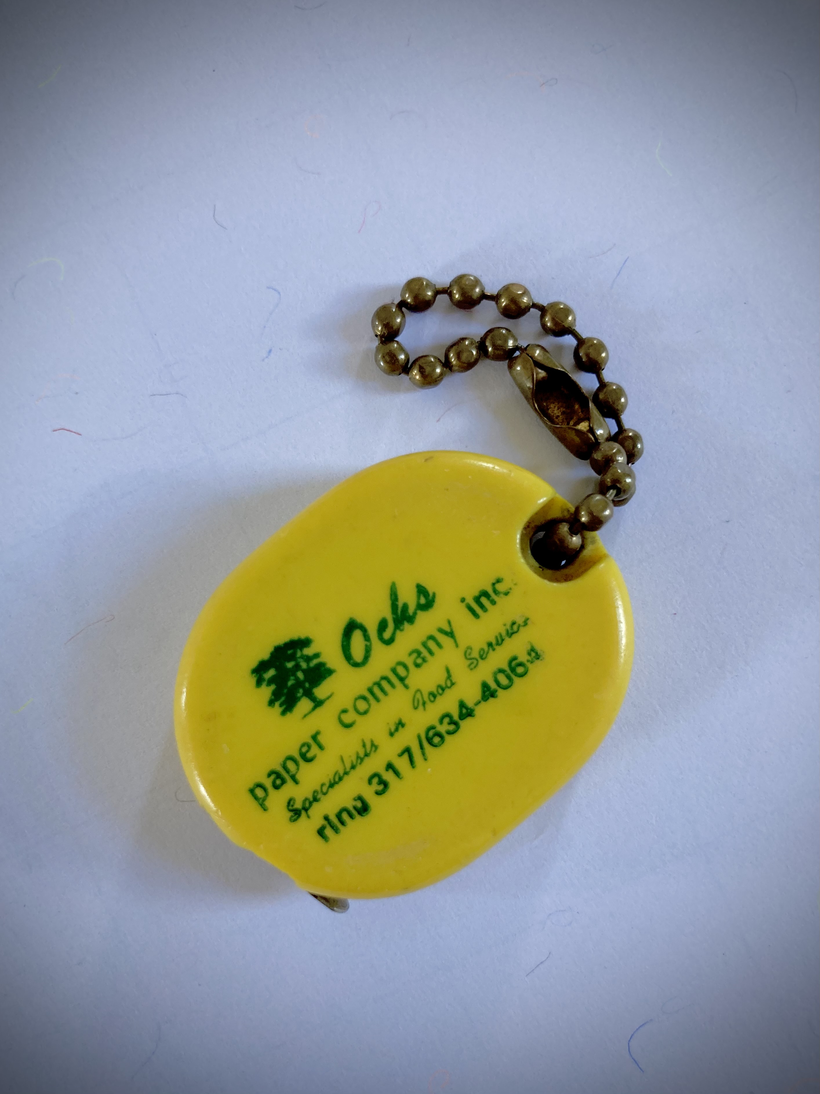 Kleines Maßband der Ochs Paper Company als Schlüsselanhänger